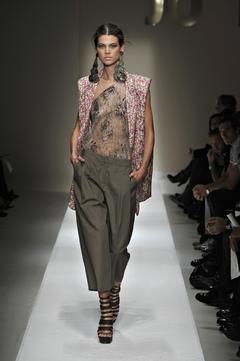 Alexandra Tomlinson in see through top runway image