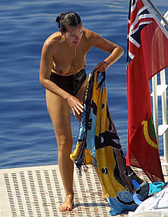 Carole Bouquet topless on a yacht paparazzi photo