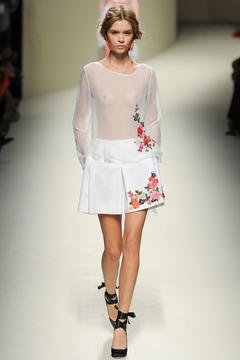 Josephine Skriver braless in see through top runway photo