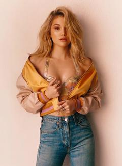 Blonde Olivia Holt posing sexy