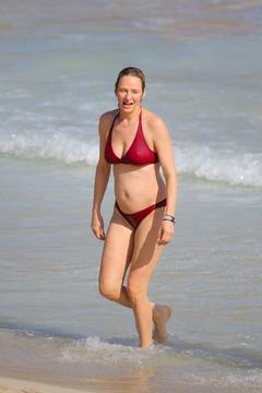 Uma Thurman pokies in red bikini at a beach in St Barts