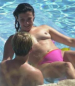 Kym Marsh topless in a pool