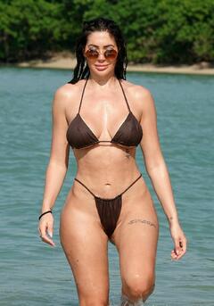 Chloe Ferry pokies in brown tiny bikini in Thailand