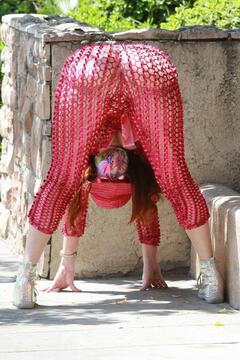 Phoebe Price shows off her see-through outfit stretching and showing off her curves in Los Angeles