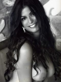 Busty Sara Tommasi topless black-&-white image