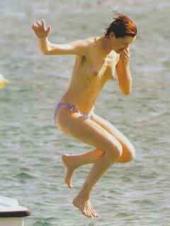 Actress Geena Davis topless paparazzi photo