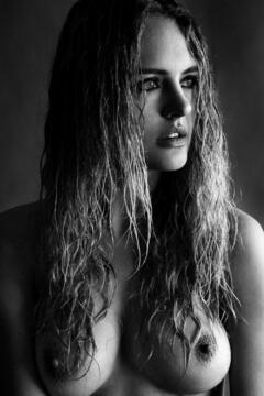 Madison Riley posing topless black-&-white photo