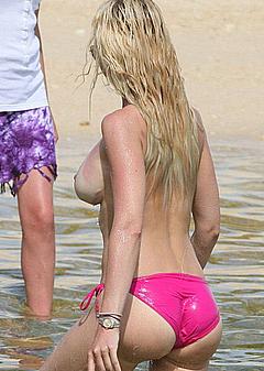 Blonde Alicia Douvall caught topless