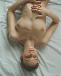 Madison Leyes nude on a bed