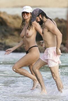 Heidi KlumHeidi Klum  topless on the beach in St. Barts - December 28, 2025