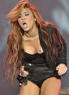 Miley Cyrus sexy performs during Rock in Rio Madrid music festival in Arganda del Rey