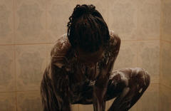 Mareme N'Diaye nude in a bath scene from Amin