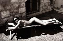 Monica Bellucci lying naked black-&-white image