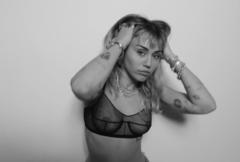 Miley Cyrus in see through bra in SHE IS COMING - D.R.E.A.M. sequence