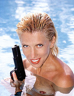 Russian singer Alena Sviridova topless with gun