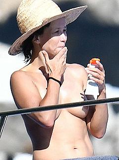 Sophie Marceau topless on a yacht in Capri