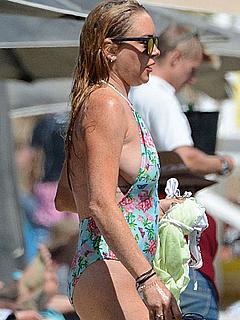 Lindsay Lohan sideboob in swimsuit