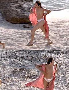 Valeria Golino topless on a beach in Respiro