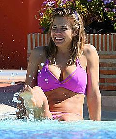 Gemma Atkinson in pink bikini in a pool in Marbella