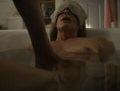 Toni Collette naked in a bathtub at The Staircase