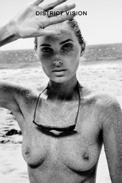 Elsa Hosk topless in a sand