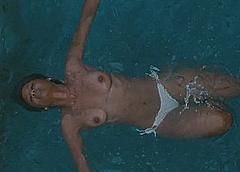 Emayatzy Corinealdi topless in a water scene from Hand of God