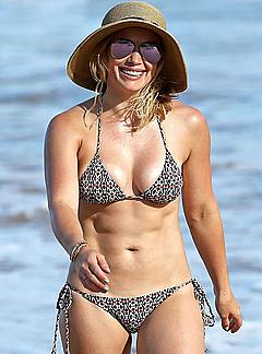 Hilary Duff sexy cleavage in bikini in Hawaii