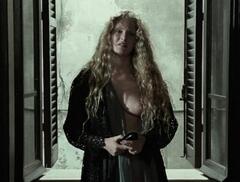Domiziana Giordano flashing her nude boob at Nostalghia