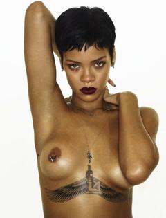 Rihanna topless piersed photo