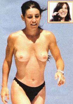 Paola Turci topless paparazzi photo