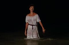 Rachel Ward in wet see through dress at Against All Odds