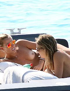 Italian Tania Cagnotto sunbathing topless on a boat