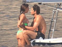 Belen Rodriguez topless on a yacht paparazzi photo
