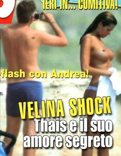 Thais Souza topless on a beach