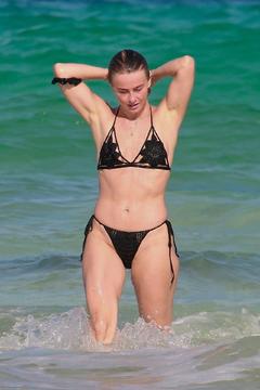 Julianne Hough sporting black bikini on a beach in Tulum