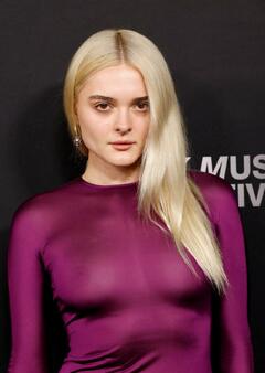 Charlotte Lawrence see through to nippless in tight dress at Recording Academy Honors presented by The Black Music Collective