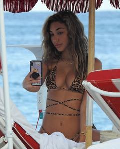 Chantel Jeffries doing selfie in leopard bikini