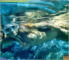 Pamela Anderson nude in a water for Boss Magazine, Italy - August 1998