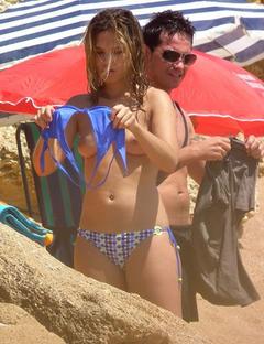 Elsa Pinilla changing on a beach shows her nude tits
