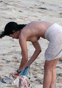 Iranian born Shermine Shahrivar caught topless on a beach