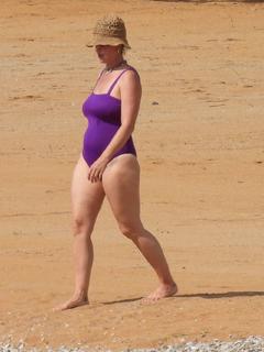 Katy Petty sporting a swimsuit on the beach in Greece