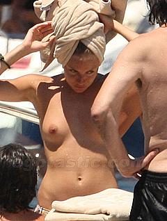 Sienna Miller caught topless
