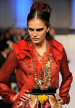 Alla Kostromichova in see through blouse runway image
