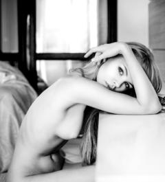 Anastasiya Scheglova sitting naked black-&-white image