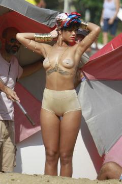 Rihanna topless with pasties on the set of a photoshoot for Vogue Brasil in Angra dos Reis Costa Verde