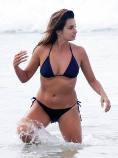 Penelope Cruz Bikini in black bikini candids on the beach in Brazil