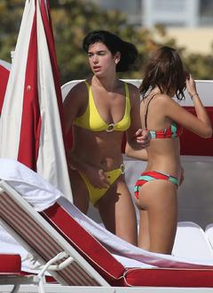 Dua Lipa in yellow bikini