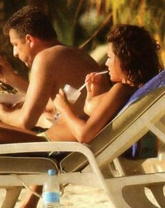 Laura Prostamo sunbathing topless