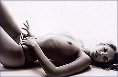 Ruth Crilly lying topless