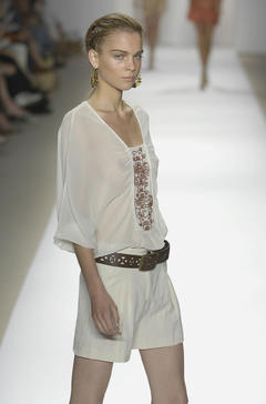 Kim Noorda in see through dress runway photo